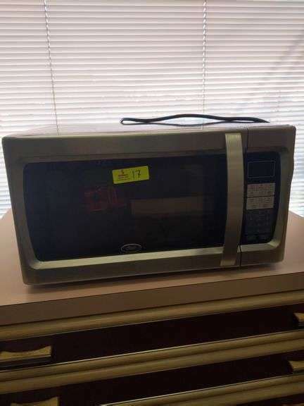 OSTER MICROWAVE - EK Auctioneers LLC