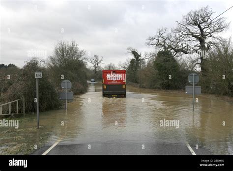 Winter Weather A Truck Passes Through Floods As The River Wid Bursts