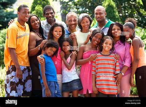 Extended African family smiling together Stock Photo - Alamy