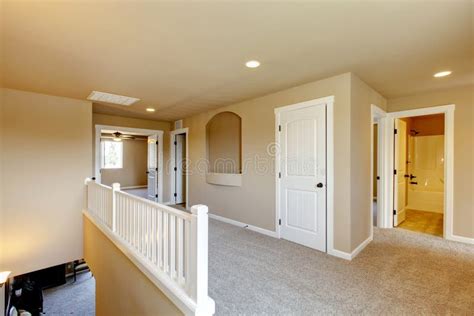 Upstairs Hallway In Big House With Beige Interior Paint Stock Image