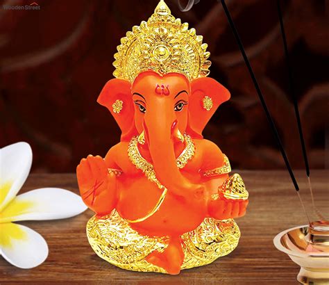 Buy Gold Plated Orange Ceramic Ganesha Idol Online In India At Best