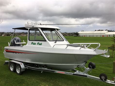 Моторная лодка с каютой c подвесным мотором - 610 Pro HT - AMF Boat ...