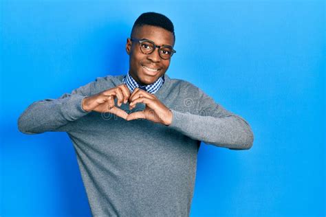 Young African American Man Wearing Business Style And Glasses Smiling