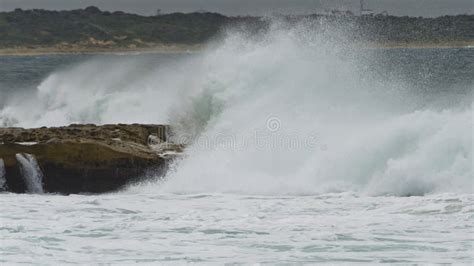 Wave Crashing Into Rocks Stock Photo Image Of Water 52775344