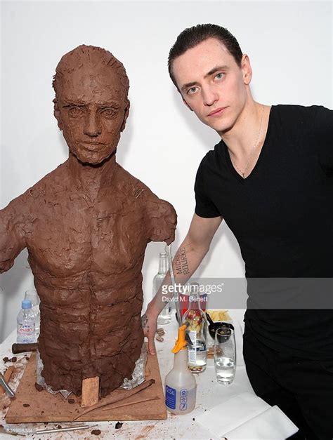 Sergei Polunin Poses Next To The Sculpture While Artist Frances