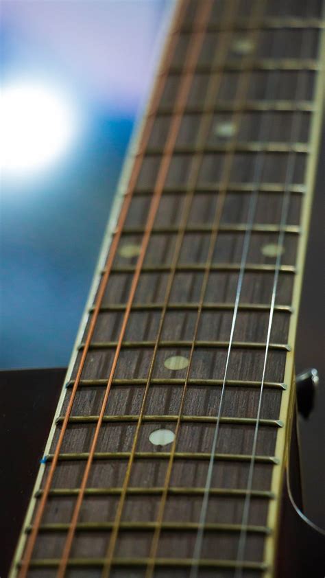 Close Up Shot Of Guitar Fretboard · Free Stock Photo