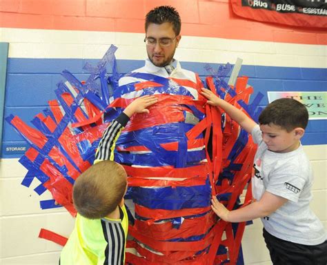 Pohatcong School's principal taped to wall for charity (PHOTOS, VIDEO ...