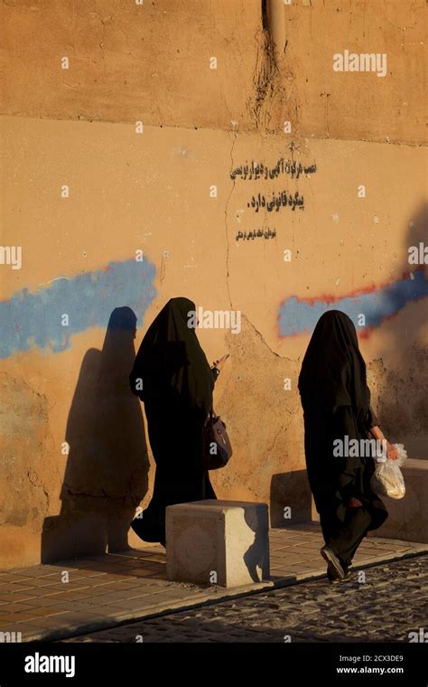 Iranian Women Wearing Black Chador In Shiraz Iran Stock Photo Alamy