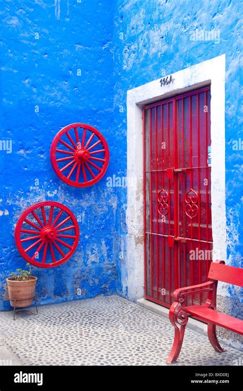 Colorful Courtyard With Red Doors And Blue Walls In Arequipa Peru