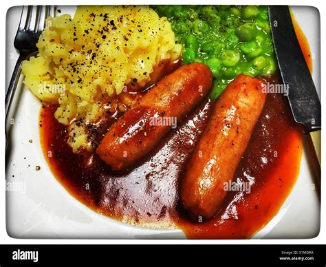 Sausages mashed potatoes and mushy peas Stock Photo - Alamy