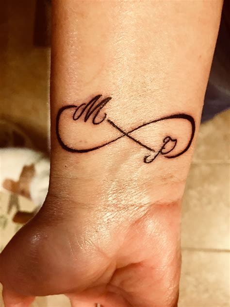 Infinity Sign With Initials Wrist Tattoo Infinity Tattoo For Men