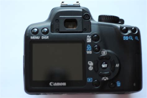 Canon EOS 1000D 10.1 MP Digital SLR Camera - Lenses and Cameras