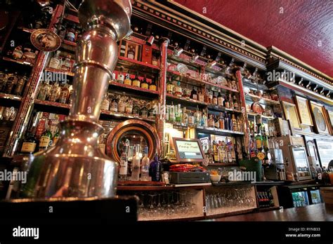 draft beer pumps in The Long Hall victorian pub one of the oldest pubs ...