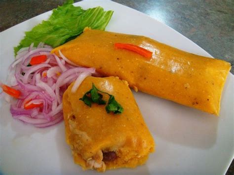 Tamal Peruano Es Una Preparación A Base De Maiz Molido Con Relleno De