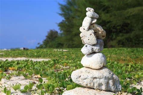 Balanced stones near the beach 10323343 Stock Photo at Vecteezy