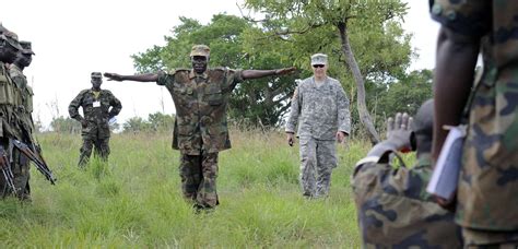 A Uganda Peoples Defense Forces Soldier Mimics An Aircraft Nara