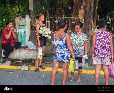 Flower Vendors Inside The Manila North Cemetery In Anticipation For