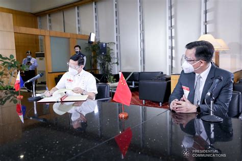 Health Secretary Francisco Duque Iii And Chinese Ambassador To The