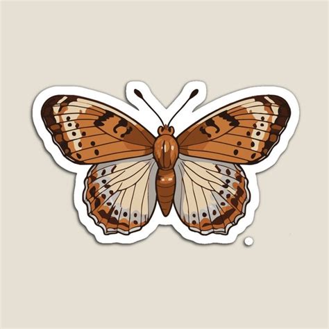 A Brown And White Butterfly Sticker Sitting On Top Of A Gray Background