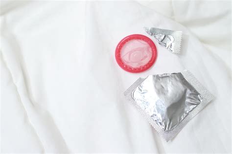 Premium Photo Condom Ready To Use In Female Hand Give Condom Safe Sex