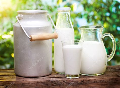 Milk In Various Dishes Stock Photo By Valentyn Volkov