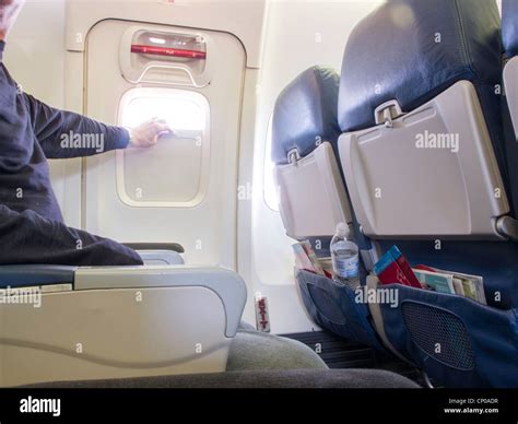 Airplane emergency exit hi-res stock photography and images - Alamy