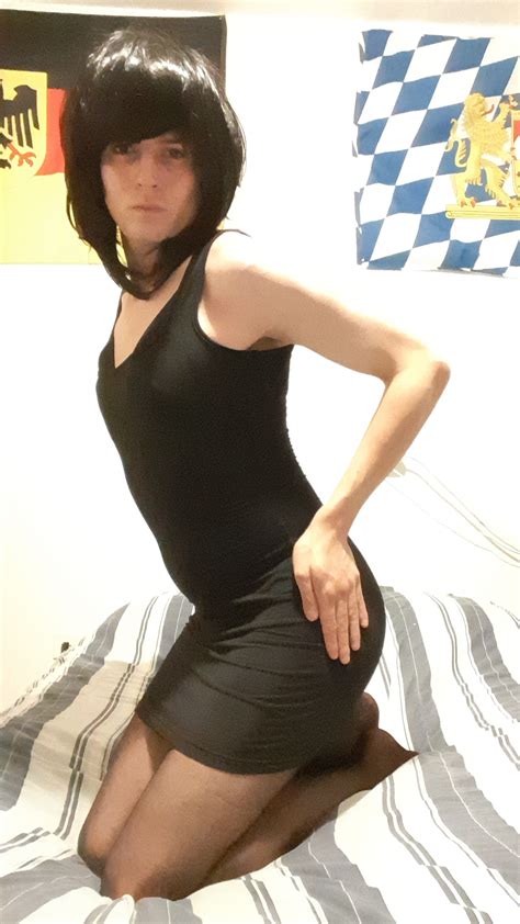 Horny Crossdresser Striptease And Posing Session On The Dining Room Table Photo