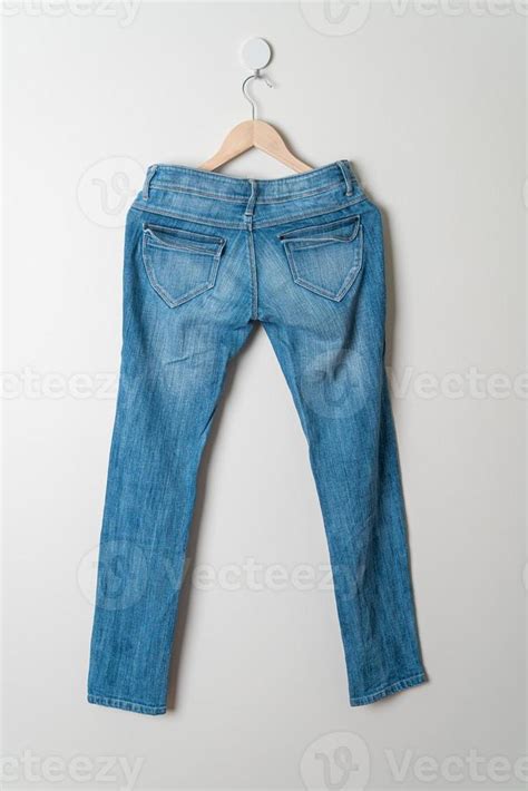 Jeans Trousers Hanging On Wall 5295899 Stock Photo At Vecteezy