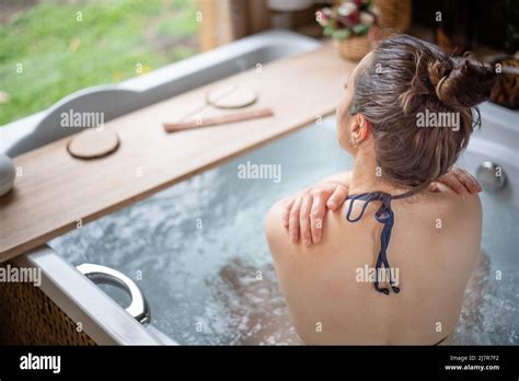 Self Care Concept Woman Embracing Herself In A Hot Tub Stock Photo Alamy