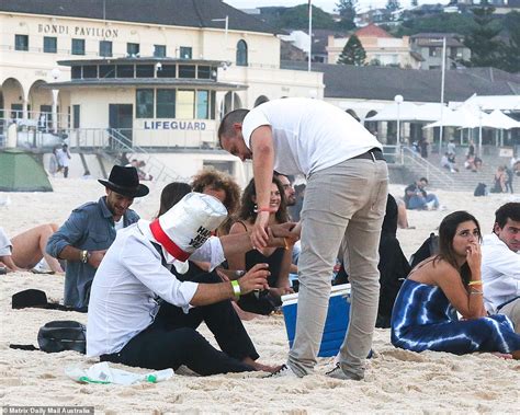 New Years Eve Sydney Revellers Look Worse For Wear As They Watch The Sunrise At Bondi Daily