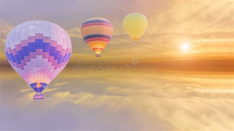 Multi Color Hot Air Balloon Rising Up To Sky In Morning Of Sunrise