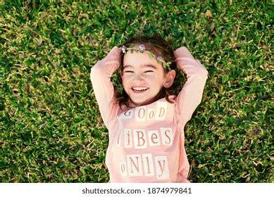 Little Girl Lying Grass Wearing Flower Stock Photo 1874979841 | Shutterstock