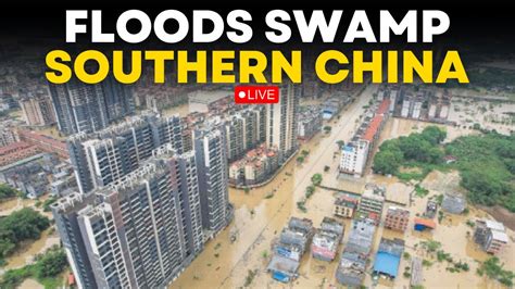 China Floods Live Massive Floods Force Tens Of Thousands To Evacuate