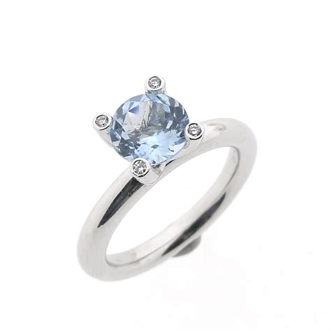 Witgouden Phlox Ring Gezet Met Aquamarijn En Diamant 0 04 Ct Bron