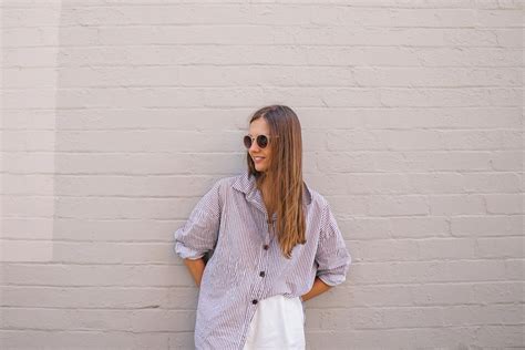 Woman Wearing White Button Up Long Sleeved Blouse · Free Stock Photo