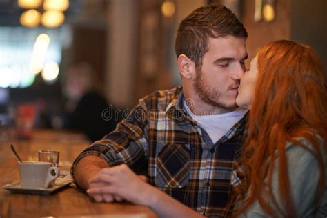 Redhead Man Kissing Brunette Woman Stock Photos Free Royalty Free