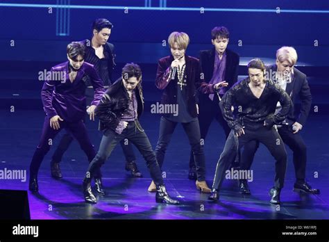 Members Of South Korean Boy Group Super Junior Perform At The MV