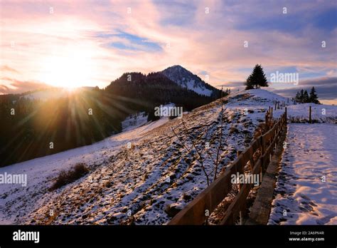 Panoramic Sunset With Sunrays Over Bavarian Alps Near Tegernsee Stock