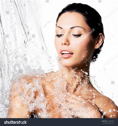Beautiful Naked Woman Wet Body Splashes Stock Photo