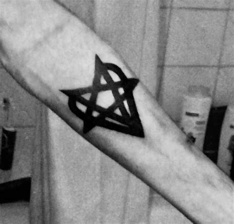 Heartagram tattoo in 2024 | Heartagram tattoo, Sick tattoo, Cool tattoos