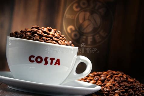 Composition With Cup Of Costa Coffee Coffee And Beans Editorial Photo