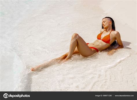Woman Wearing Orange Bikini Lying Tropical Beach Summer Pretty Dreadlocks Stock Photo