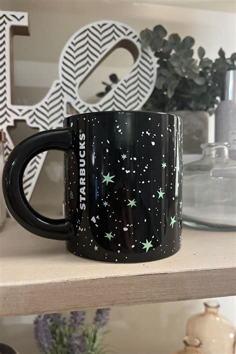 Starbucks' New Glow-in-the-Dark Mug Shows a Neon Green Starry Night