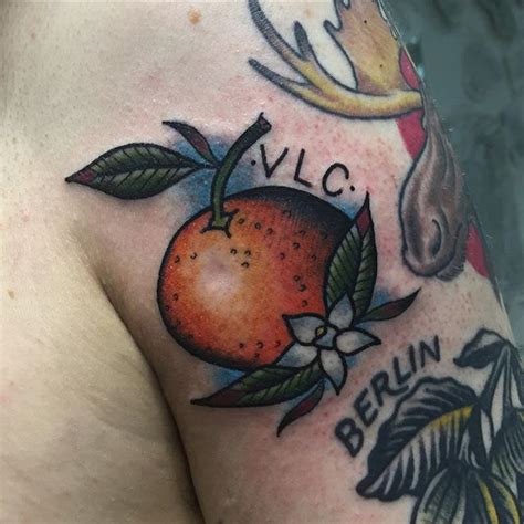 Share 66+ orange fruit tattoo - in.cdgdbentre