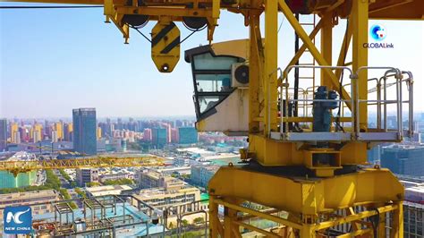 A 35 Year Old Woman Who Works As A Tower Crane Operator In East China S