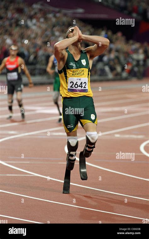 Oscar Pistorius Celebrates After Winning The Gold Medal In The Men S