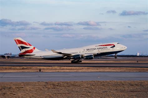 British Airways Boeing 747 taking off from DFW Photograph by Erik Simonsen