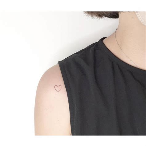 Minimalistic Style Heart Tattoo Located On The