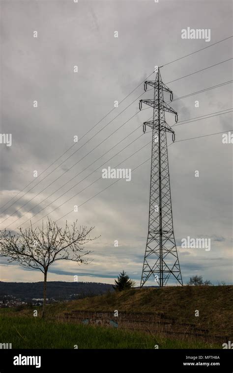 Electricity Pylon Power Lines Field Hi Res Stock Photography And Images