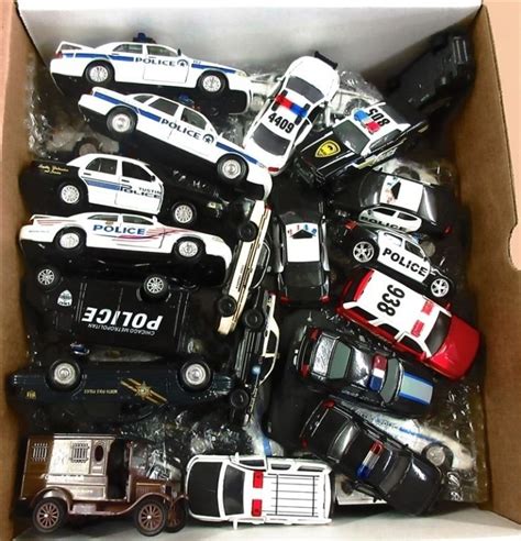 (23) 1:43 SCALE (14) 1:64 DIECAST POLICE CARS